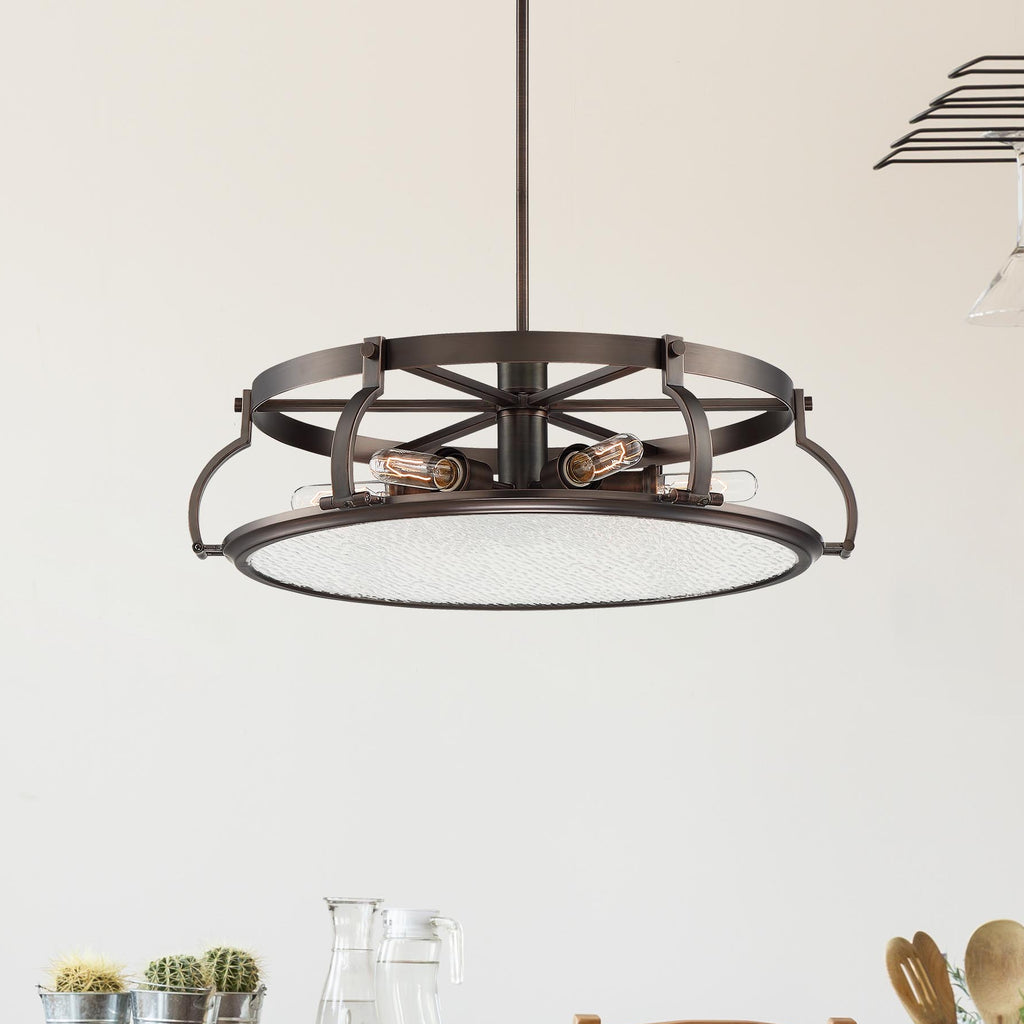Modern dining area with wooden and metal furniture, plants, and a chalkboard wall.