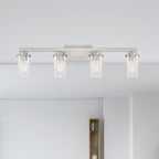 Jedrek 33.75 in. 4-Light Brushed Nickel Minimalist Vanity Light with Clear Glass Shades for Bathrooms