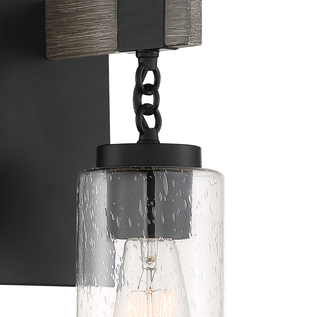 Fulton 4 in. 1-Light Matte Black Industrial Wall Sconce with Clear Seedy Glass Shade for Living Rooms