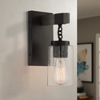 Fulton 4 in. 1-Light Matte Black Industrial Wall Sconce with Clear Seedy Glass Shade for Living Rooms