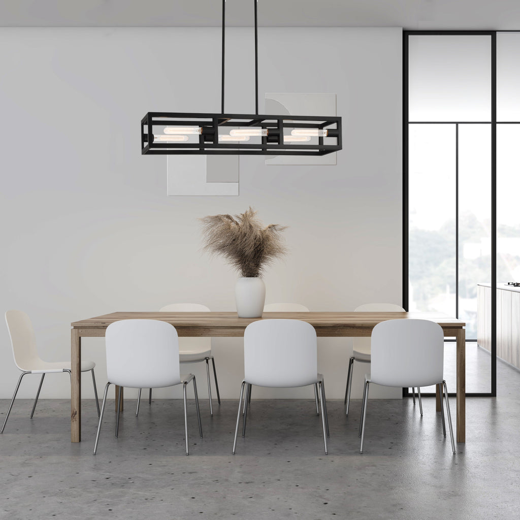 Modern dining area with a long wooden table and white chairs, featuring a pendant light fixture.