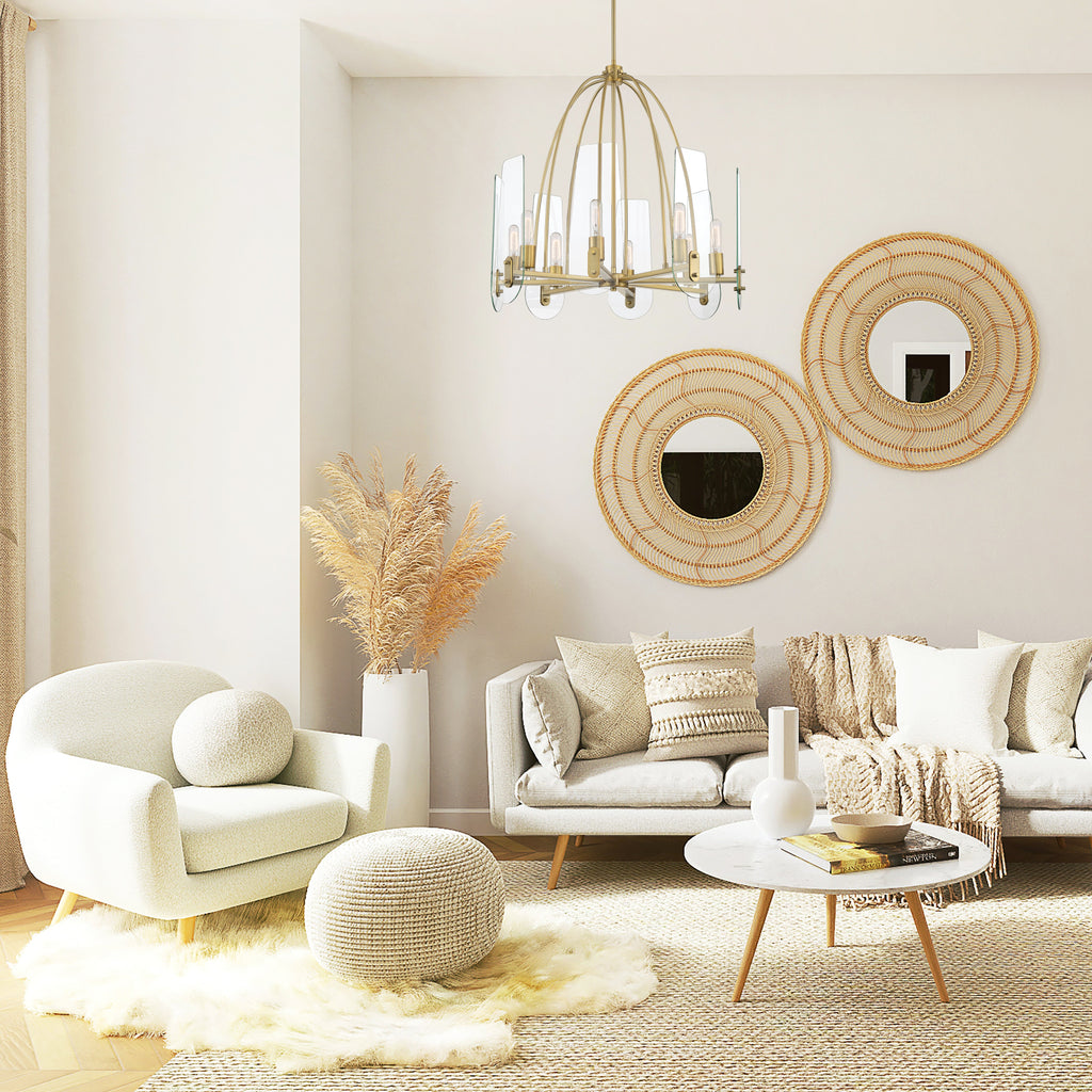 Modern living room with white furniture, decorative mirrors, and a chandelier.