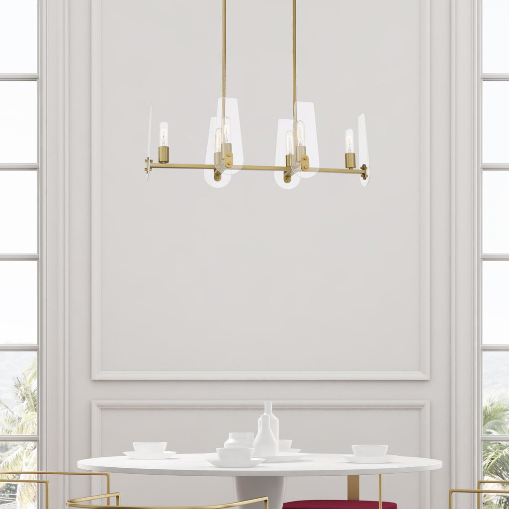 Modern dining set with chairs and a table in a room with large windows.