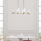 Modern dining set with chairs and a table in a room with large windows.