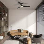 Modern living room with a beige sofa, gray armchair, and wooden shelves.